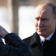 Russian President Vladimir Putin greeting the minister of defense at an event at Moscow’s Tomb of the Unknown Soldier, 2018.